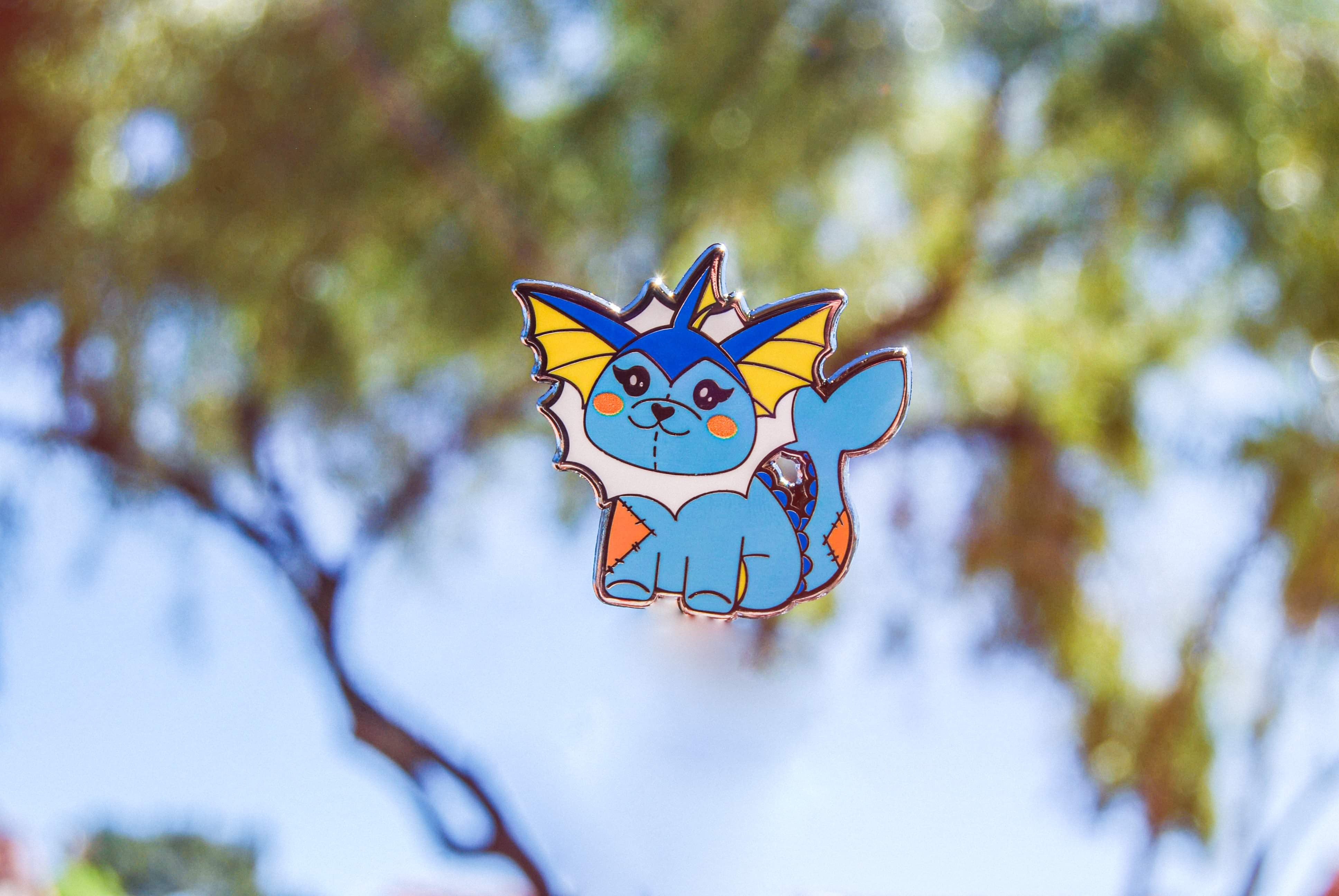 Water Type Plusheelution Enamel Pin